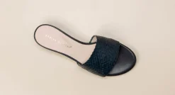 Damen Andrea Puccini – Mules aus Flechtleder in Schwarz