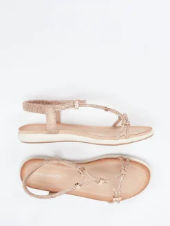 – Zehensteg-Sandalen aus Metallicleder*Andrea Puccini Online