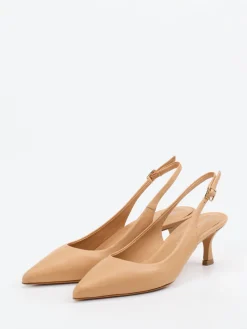 – Slingpumps aus Lackleder*Konstantin Starke