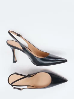– Slingpumps aus Hochglanzleder*Konstantin Starke New