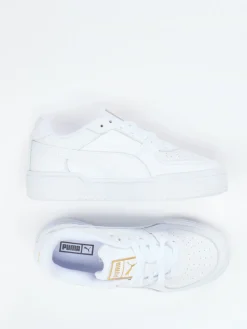 Damen Puma – Sneaker aus Glattleder mit Goldakzenten